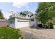 Home exterior with upper patio, garage and driveway at 5946 N New Jersey St, Indianapolis, IN 46220