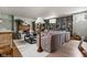 Cozy living room with built-in bookshelves, fireplace, and comfortable seating arrangement at 5946 N New Jersey St, Indianapolis, IN 46220