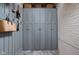Functional mudroom with gray lockers and hooks, providing ample storage and organization at 5946 N New Jersey St, Indianapolis, IN 46220