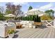 Inviting patio space with ample seating, umbrellas, and lovely landscaping at 5946 N New Jersey St, Indianapolis, IN 46220