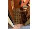 Bathroom featuring tiled floors, a toilet with a plush seat cover and a vintage vanity at 6040 Ipswich Ct, Indianapolis, IN 46254