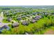 Overhead shot featuring homes with tidy yards and mature trees in a peaceful residential setting at 6054 Easy Ln, Indianapolis, IN 46259