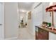 Neutral hallway showcases stylish decor and provides access to other rooms in the home at 6054 Easy Ln, Indianapolis, IN 46259
