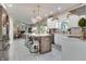Bright, spacious kitchen with white cabinets, a large island, and modern appliances at 6054 Easy Ln, Indianapolis, IN 46259