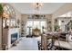 Inviting living room features fireplace, lots of natural light, with neutral decor and a comfortable seating area at 6054 Easy Ln, Indianapolis, IN 46259