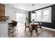 Eat-in dining area with modern lighting and sliding glass door at 611 Tecumseh St, Indianapolis, IN 46201