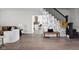 Bright and open living room with hardwood floors and stylish decor at 611 Tecumseh St, Indianapolis, IN 46201