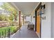 Inviting front porch with comfortable seating, perfect for relaxing outdoors at 611 Tecumseh St, Indianapolis, IN 46201