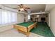 Finished basement featuring a pool table and neutral carpet for a comfortable recreation space at 614 Debra Ln, Indianapolis, IN 46217