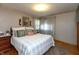Cozy bedroom featuring a comfortable bed, soft lighting, and stylish decor at 614 Debra Ln, Indianapolis, IN 46217