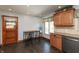 Well-lit kitchen with granite countertops and stainless steel appliances at 614 Debra Ln, Indianapolis, IN 46217