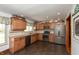 Spacious kitchen with stainless steel appliances and ample cabinet space at 614 Debra Ln, Indianapolis, IN 46217