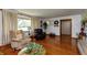 Inviting living room featuring hardwood floors and a large window that provides plenty of natural light at 614 Debra Ln, Indianapolis, IN 46217