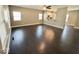 Open-concept living room boasts hardwood floors and abundant natural light at 6157 Winthrop Ave, Indianapolis, IN 46220