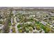 Overhead shot of a neighborhood with houses, ponds, and green spaces at 6159 Connie Ct, Indianapolis, IN 46237