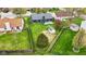 Expansive backyard with a black fence, storage shed, and a patio for outdoor living at 6159 Connie Ct, Indianapolis, IN 46237