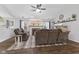 Comfortable living room with vaulted ceiling, fireplace, and plush seating at 6159 Connie Ct, Indianapolis, IN 46237