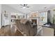 Cozy living room with fireplace and open view to the modern kitchen at 6159 Connie Ct, Indianapolis, IN 46237