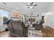 Spacious living room with vaulted ceiling, fireplace, and comfortable furniture at 6159 Connie Ct, Indianapolis, IN 46237
