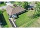 Aerial view of the backyard featuring green lawn and a covered gazebo area with a fence at 6232 Buck Trail Rd, Indianapolis, IN 46237