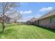 Large grassy backyard features a gazebo at 6232 Buck Trail Rd, Indianapolis, IN 46237