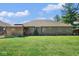 A well-maintained backyard with lush lawn and a wooden gazebo at 6232 Buck Trail Rd, Indianapolis, IN 46237