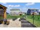 Backyard features landscaping, lawn, and a charming gazebo at 6232 Buck Trail Rd, Indianapolis, IN 46237