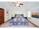 Bedroom with carpet flooring, and ceiling fan at 6232 Buck Trail Rd, Indianapolis, IN 46237