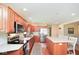 Well-appointed kitchen with stainless steel appliances, ample cabinet space, and a breakfast bar at 6232 Buck Trail Rd, Indianapolis, IN 46237