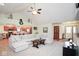 Spacious living room with vaulted ceiling, opening up to the kitchen and entry at 6232 Buck Trail Rd, Indianapolis, IN 46237