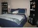 Inviting bedroom with a comfortable bed, creating a relaxing personal space at 6350 Emerald Springs Dr, Indianapolis, IN 46221