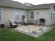 Back patio with comfortable seating, ideal for outdoor relaxation and entertaining at 6350 Emerald Springs Dr, Indianapolis, IN 46221