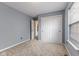 Bright bedroom features neutral walls, plush carpet, and a double sliding door closet at 6514 Trevia Ct, Indianapolis, IN 46236