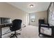 Bedroom with neutral walls and carpet, featuring work and play spaces at 6514 Trevia Ct, Indianapolis, IN 46236