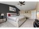 Inviting bedroom features a comfortable bed, neutral decor, and a doorway leading to another room at 6514 Trevia Ct, Indianapolis, IN 46236