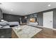 Cozy living room with a comfortable couch, patterned rug, and modern decor, creating a stylish and inviting space at 6514 Trevia Ct, Indianapolis, IN 46236