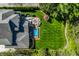 Aerial view of a house with a pool, backyard, and garden at 7602 N Pennsylvania St, Indianapolis, IN 46240