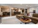 Open basement featuring a sitting area and a bar with counter seating at 7602 N Pennsylvania St, Indianapolis, IN 46240