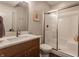Bathroom featuring a single vanity and tiled shower at 7602 N Pennsylvania St, Indianapolis, IN 46240
