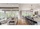 Beautiful open concept kitchen/living room with hardwood floors and lots of natural light at 7602 N Pennsylvania St, Indianapolis, IN 46240