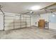 Spacious two car garage with paneled door and abundant storage potential at 7618 Ballyshannon St, Indianapolis, IN 46217