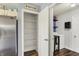 This pantry has an open door that reveals the laundry room at 7618 Ballyshannon St, Indianapolis, IN 46217