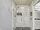 Beautiful walk-in shower with glass door and black tile floor at 7618 Ballyshannon St, Indianapolis, IN 46217