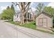 Backyard with shed, trees, and patio at 775 W Hawthorne St, Zionsville, IN 46077