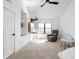 A well-lit bedroom featuring neutral colors, a seating area and a deer head mount at 775 W Hawthorne St, Zionsville, IN 46077