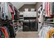 Spacious closet and laundry room with ample storage and a washer and dryer at 775 W Hawthorne St, Zionsville, IN 46077
