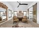 Spacious main bedroom with vaulted ceiling, accent chairs, and natural light at 775 W Hawthorne St, Zionsville, IN 46077