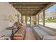 Inviting sunroom featuring wicker furniture, neutral decor, string lights, and bright, natural light at 775 W Hawthorne St, Zionsville, IN 46077