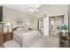 Bedroom with vaulted ceiling, complemented by classic furnishings and access to a modern en-suite bathroom at 7786 Harbour Isle, Indianapolis, IN 46240
