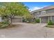 Triple attached garage featuring a well-maintained exterior with landscaped entryways, offering curb appeal and convenience at 7786 Harbour Isle, Indianapolis, IN 46240